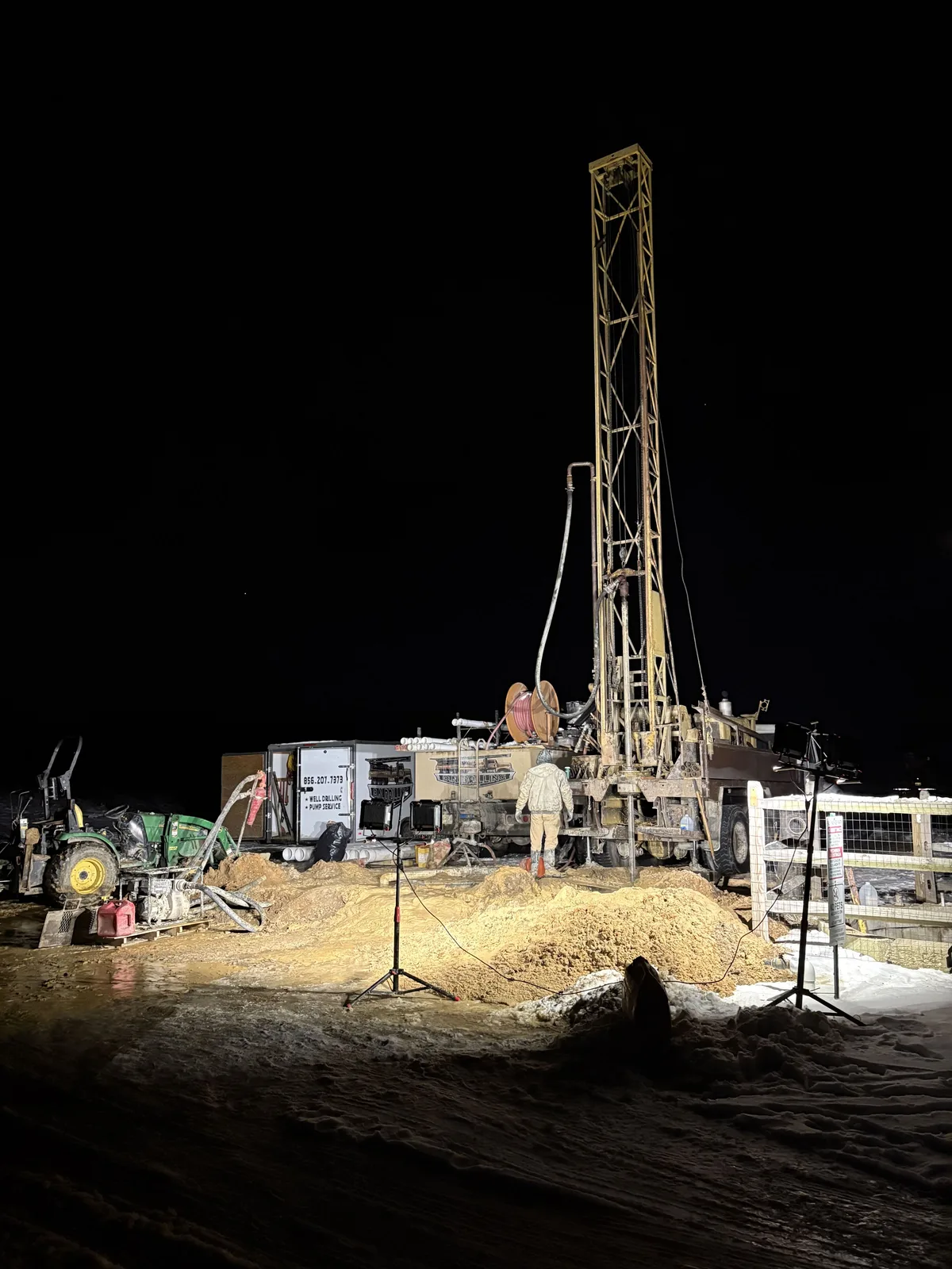 Rig lit up on a late-night well job